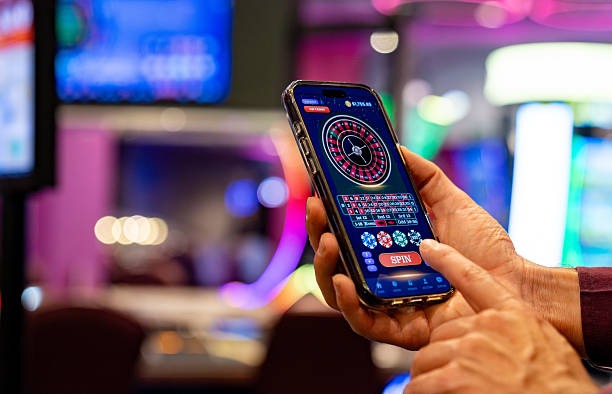 Mobile phone displaying Number Table game interface with betting options and live dealer
