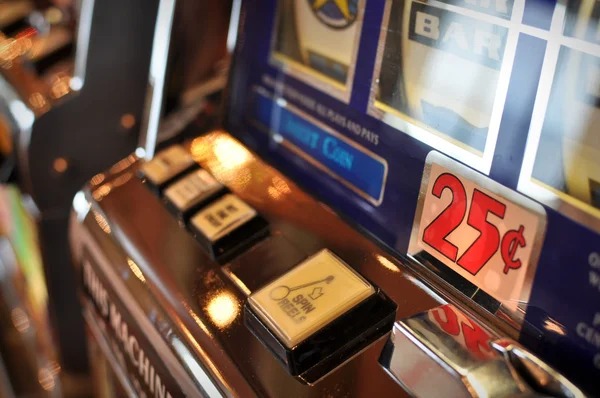 Mobile phone displaying Tarung Mesin betting interface with machine prediction options